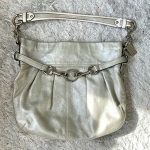 Coach silver suede bag. With some light wear and tear marks on the back.